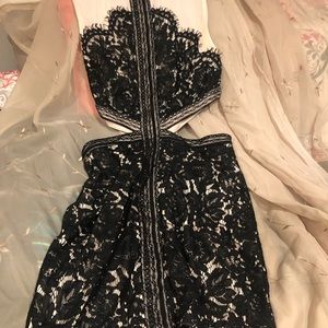 Tobi size LG black and cream lace cocktail dress.